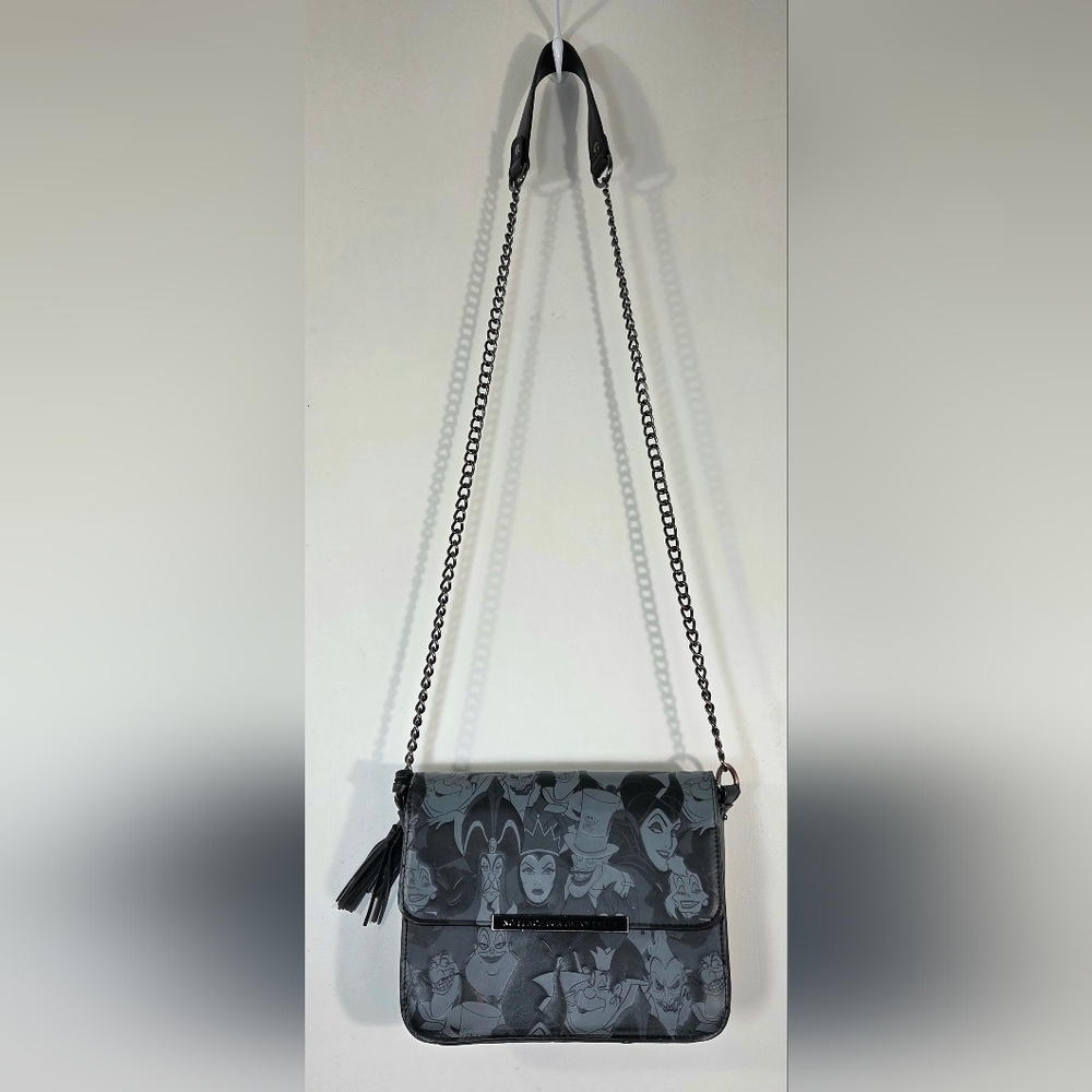 LOUNGEFLY DISNEY VILLAINS DEBOSSED CROSS BODY BAG.